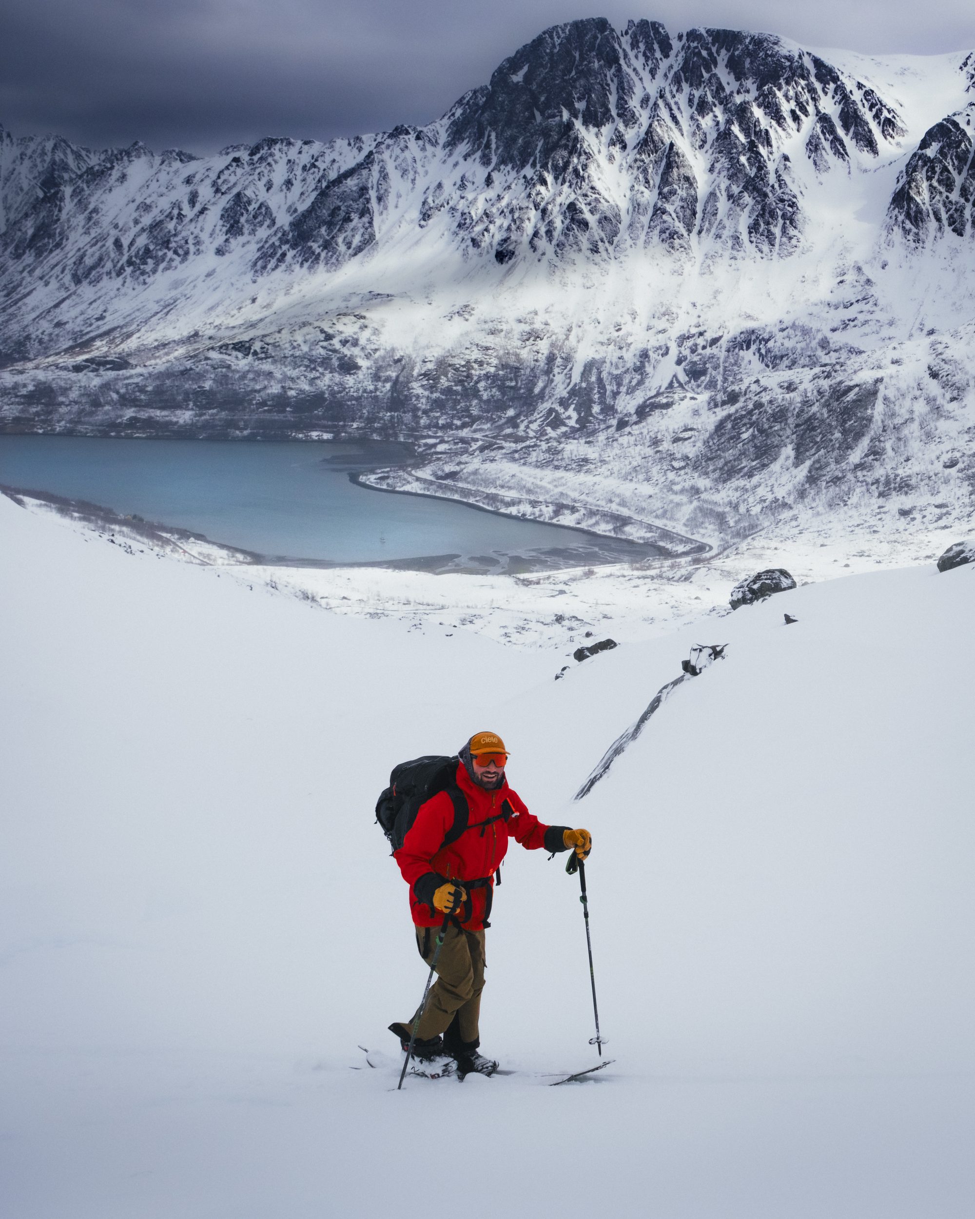 Skinner pausing above fjord arm
