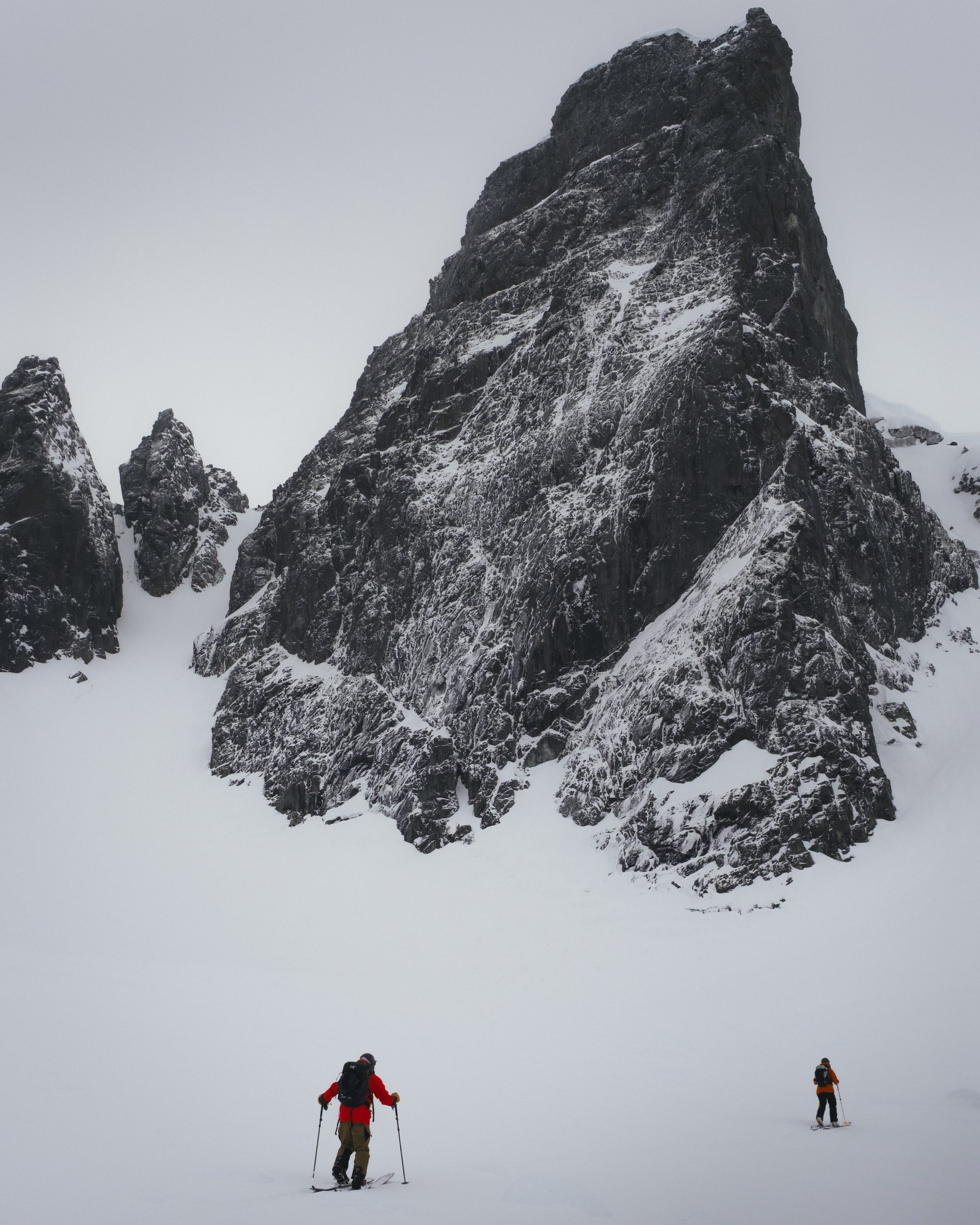 Two figures at the col, east of Lyngen